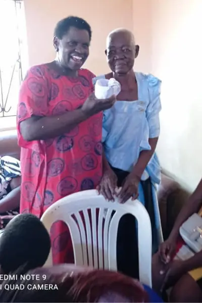 helping tormented people at AOW Families At Uganda