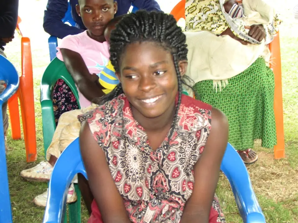 Helping the poor at AOW families In Uganda